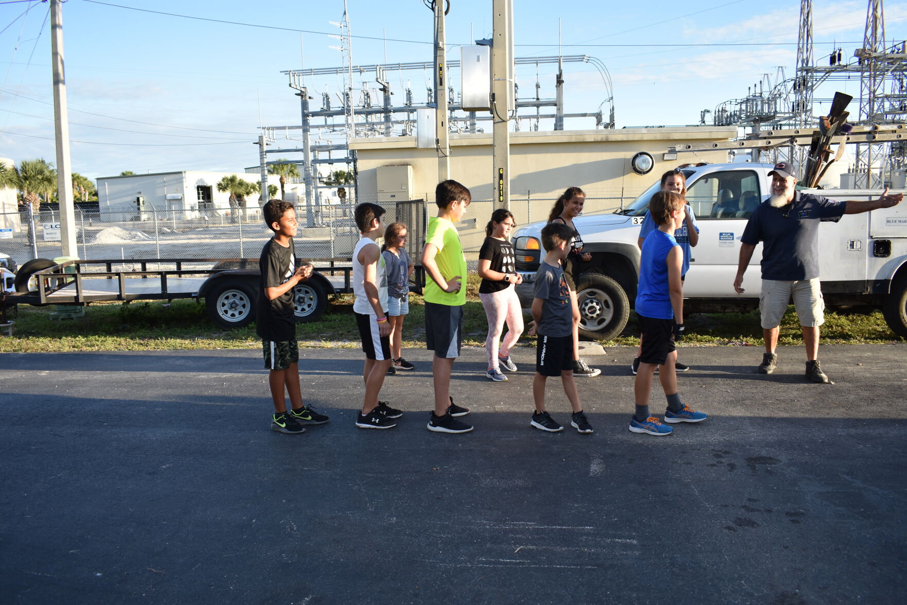 Kids Living Their Best 1. Kids lining up for their warmup relay..JPG